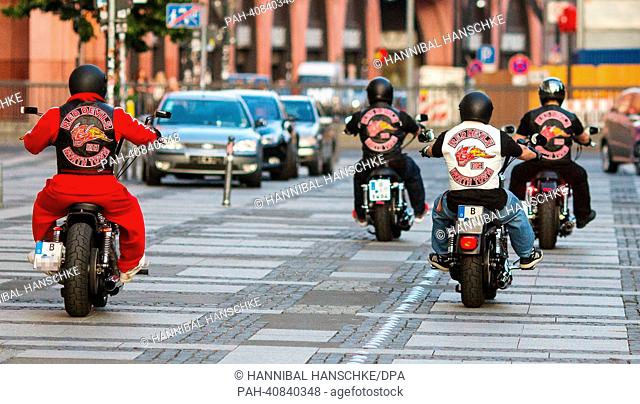Bikers of biker club 'Red Devils' drive their motorcycles on Alexanderplatz in Berlin, Germany, 02 July 2013. The 'Red Devils' are considered supporters of...