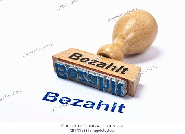 stamp with inscription in German 'paid', 'bezahlt'