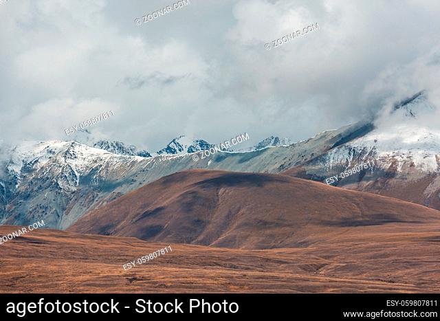 Picturesque mountain landscape on rainy day in Summer time. Good for natural background