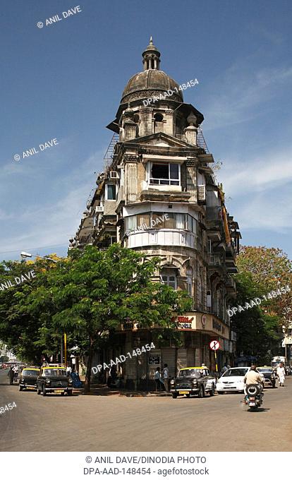 Buildings between two roads ; Bombay now Mumbai ; Maharashtra ; India