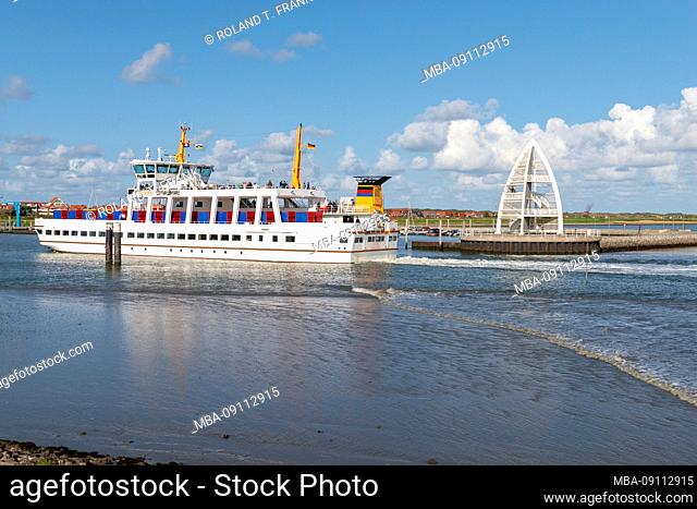 Germany, Lower Saxony, East Frisia, Juist, ferry at the entrance to the harbor