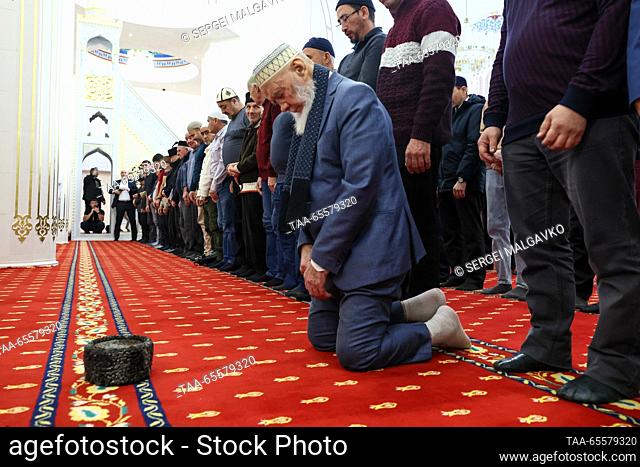 RUSSIA, SIMFEROPOL - DECEMBER 9, 2023: Believers take part in a mass prayer at the newly built Cathedral Mosque, the largest one in Crimea