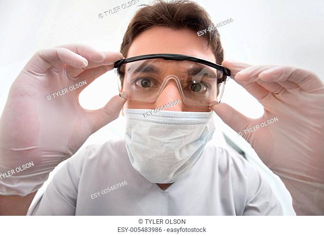Dentist adjusting eyewear