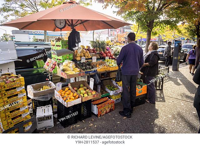 A produce vendor in the City Line neighborhood on the Brooklyn-Queens border in New York. The small neighborhood has become an enclave for Bangladeshi...