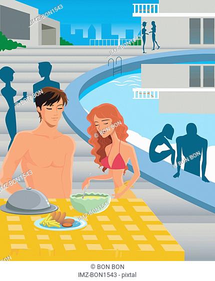A man and woman eating poolside