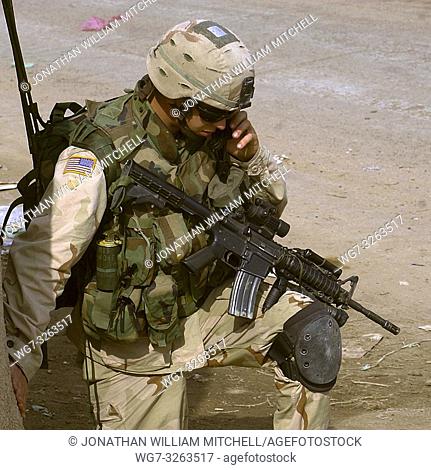 IRAQ Fallujah -- 12 Feb 2004 -- A soldier assigned to B Company, 1st of the 505th Parachute Infantry Regiment of the 82nd US Airborne Division keeps in...