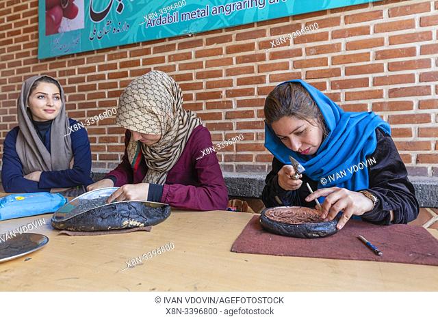 Girls working with traditional metal chasing, Sheikh Safi-ad-din Ardabili complex, Ardabil, Ardabil Province, Iran