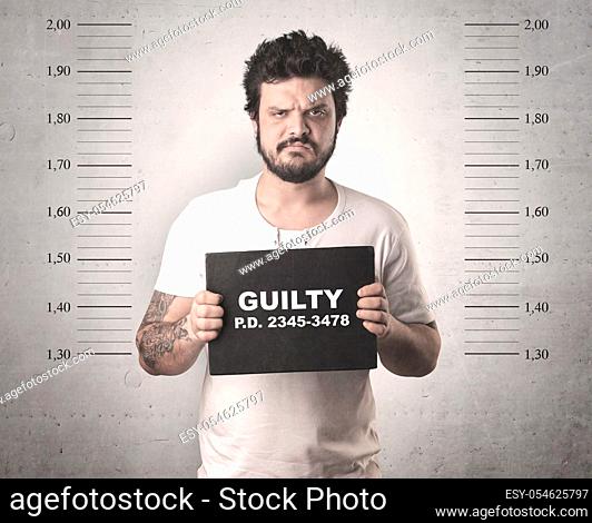 Caught guilty man with ID signs on his hand