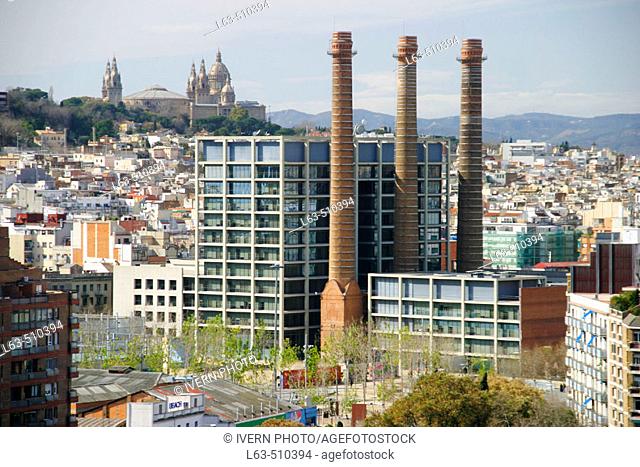 'Tres Xemeneies' former industrial complex at Avinguda del Paral.lel. Montjuic in background. Barcelona. Spain