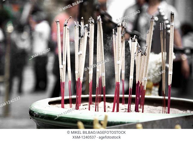 Incense sticks  Wat Phra Kaew, or Temple of the Emerald Buddha  Gran Palace  Bangkok, Thailand