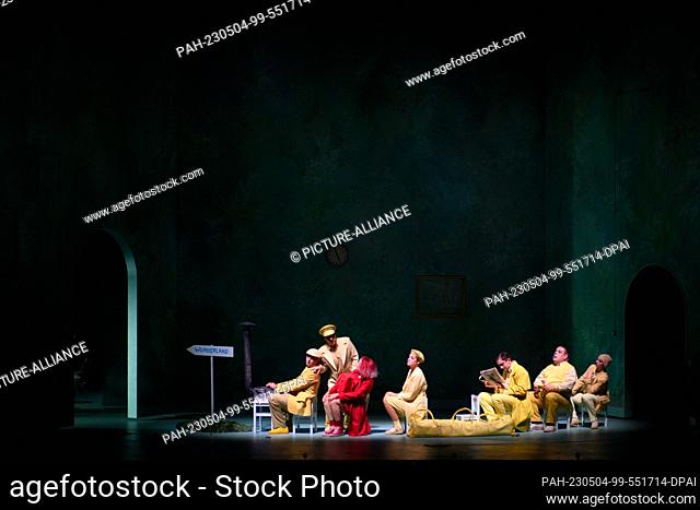 PRODUCTION - 03 May 2023, Saxony-Anhalt, Magdeburg: Alison Scherzer (3rd from left) as ""Alice"" rehearses a scene from the opera ""Alice in Wonderland"" by...