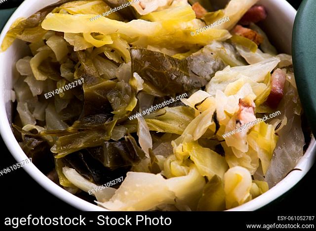 Stew of white cabbage and bacon. Vegetables, background