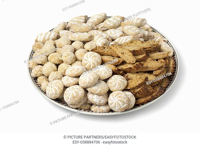 Dish with Moroccan festive homemade cookies isolated on white background