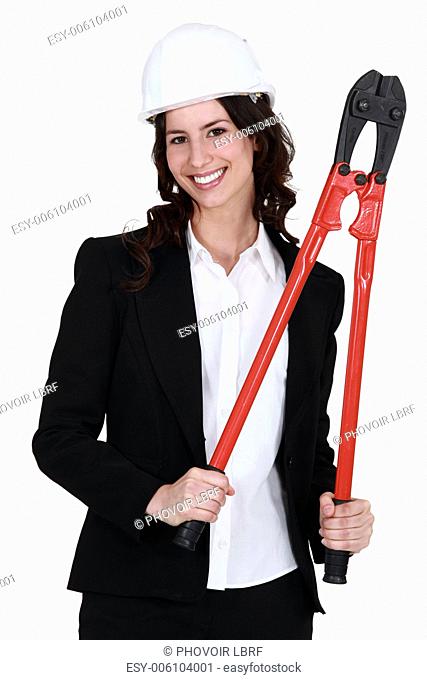 Corporate woman holding pliers