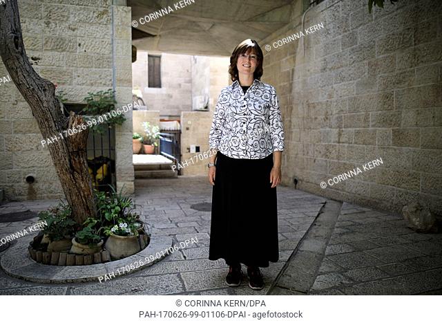 Chaja Weisberg, ultra orthodox marriage broker can be seen outside her hostel for Jewish Girls (Heritage House) in the inner city of Jerusalem, Israel