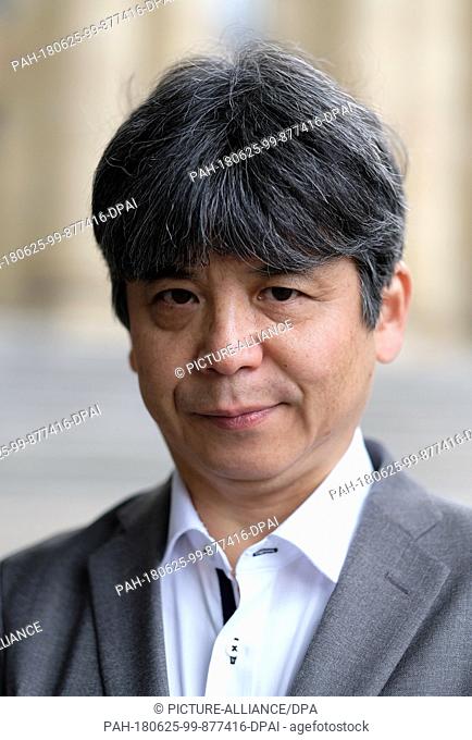 25 June 2018, Germany, Stuttgart: The Japanese composer Toshio Hosokawa stands in front of the Opera House. On order of the Opera Stuttgart he is designing an...