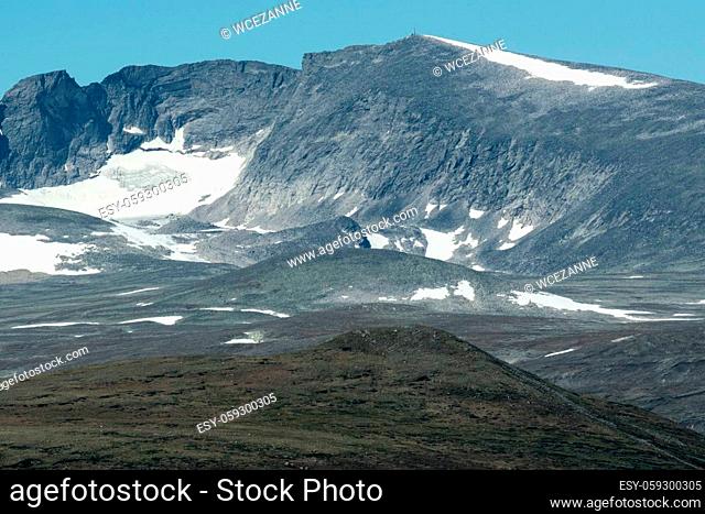The Snéhetta is a mountain in the Dovrefjell region of Innlandet Province, Norway. At 2286 m, it is the highest mountain in Norway outside Jotunheimen