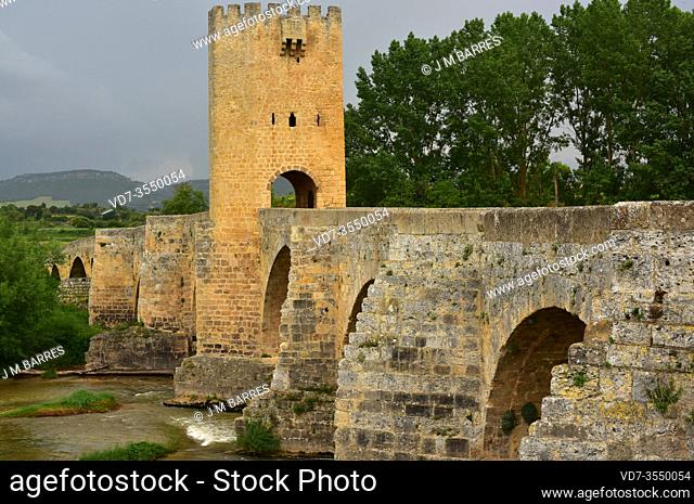 Medieval bridge (romanesque) and defense tower (14th century) over Ebro River near Frias. Burgos province, Castilla y Leon, Spain