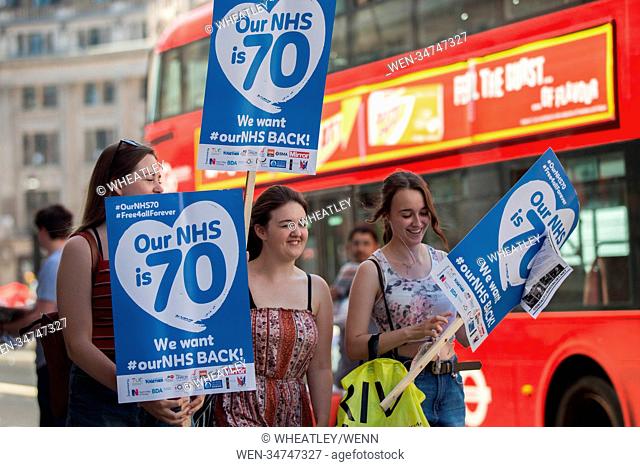 Tens of thousands of people join a huge demonstration to mark the 70th anniversary of the National Health Service. Featuring: Atmosphere, View Where: London