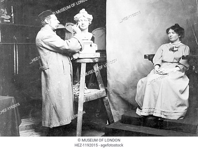 Christabel Pankhurst being modelled at Madam Tussaud's by Mr Tussaud, c1908. She was the eldest daughter of Dr. Richard Pankhurst and Emmeline Pankhurst