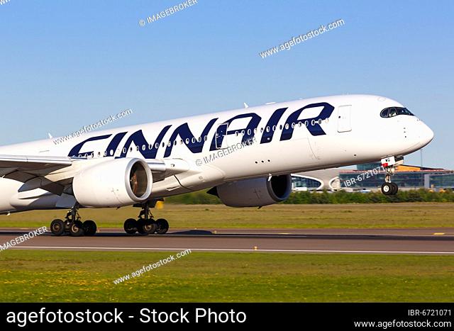 A Finnair Airbus A350-900 with the registration OH-LWG takes off from Helsinki Airport, Finland, Europe
