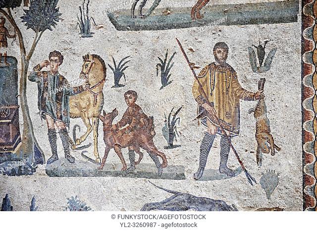Hunter with a hare. Roman mosaic floor of the Room of The Small Hunt, no 25 - Roman mosaics at the Villa Romana del Casale