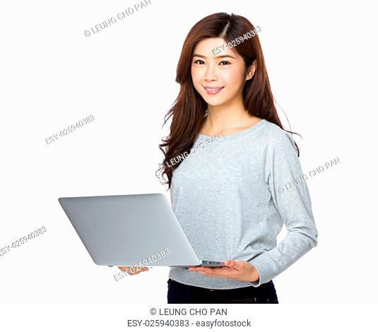 Young Woman use of the notebook computer