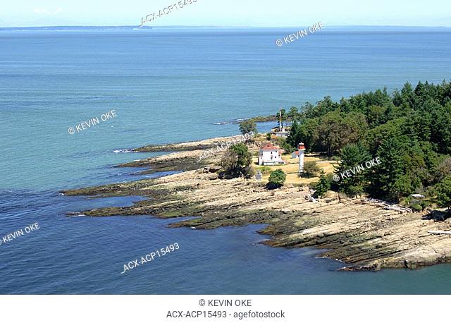 The Georgina Point Lighthouse at the entrance to Active Pass, Mayne Island, BC. Aerial photography of the Southern Gulf Islands