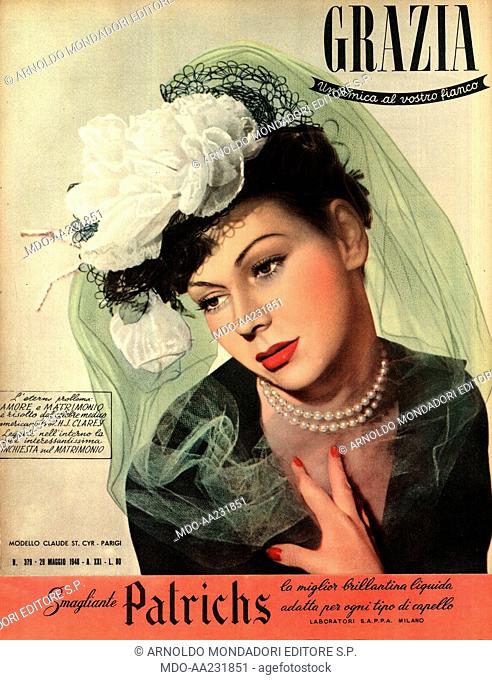 Cover of women's magazine. The cover of the women's magazine Grazia showing a young woman posing. Below, the advertisement of Patrichs brilliantine