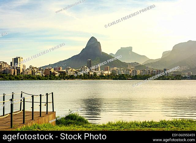 Late afternoon at Rodrigo de Freitas lagoon in Rio de Janeiro with views of the city buildings and mountains