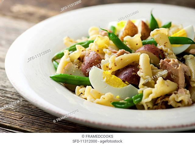 Tuna nicoise salad with pasta and red potatoes