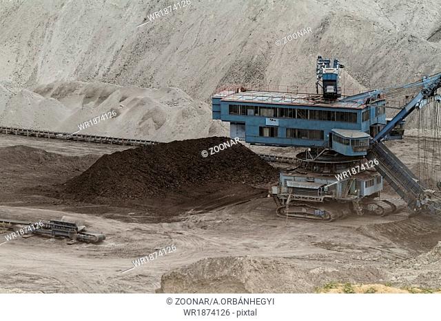 Coal mining in an open pit