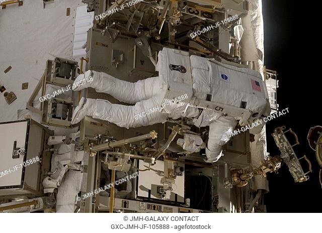 European Space Agency (ESA) astronaut Christer Fuglesang, STS-116 mission specialist, participates in the mission's second of three planned sessions of...