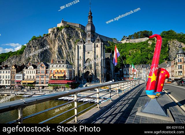 Picturesque Dinant town, Dinant Citadel and Collegiate Church of Notre Dame de Dinant and Charles de Gaulle bridge with saxophones as Dinant is hometown of...