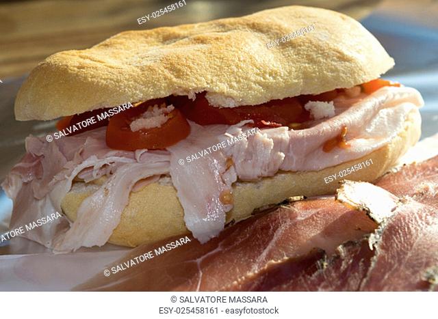 sandwich with raw ham San daniele and Italian ham steak