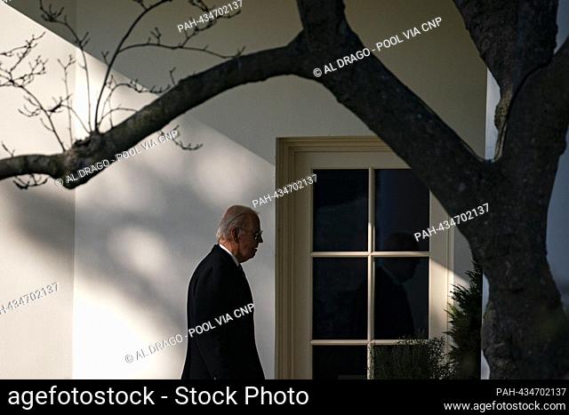 United States President Joe Biden walks to the Oval Office of the White House after arriving on Marine One in Washington, DC, US, on Monday, Nov