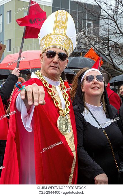 Detroit, Michigan - The Marche du Nain Rouge celebrates the coming of spring and banishes the Nain Rouge (Red Dwarf) from the city