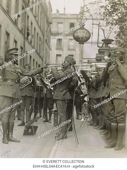 American military band plays jazz for Yankee wounded outside their Paris hospital, 1918. The 369th Infantry Regiment band was led by Lt