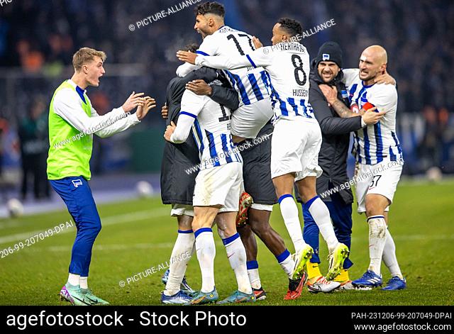 06 December 2023, Berlin: Soccer: DFB Cup, Hertha BSC - Hamburger SV, round of 16, Olympiastadion. Berlin's Fabian Reese scores to make it 2-2 and celebrates...