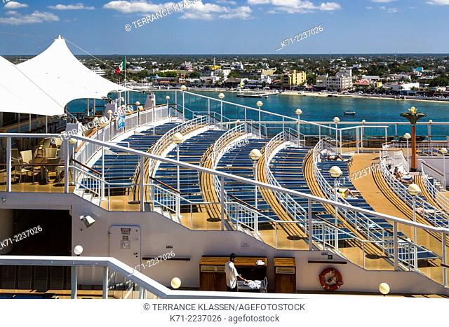 The pool deck of the Norwegian Dawn cruise ship in the port of Cozumel, Mexico
