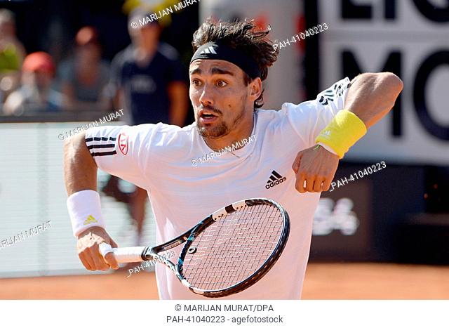 Italy's Fabio Fognini celebrates defeating Germany's Philipp Kohlschreiber during the final match against Germany's Kohlschreiber at the ATP Tour in Stuttgart