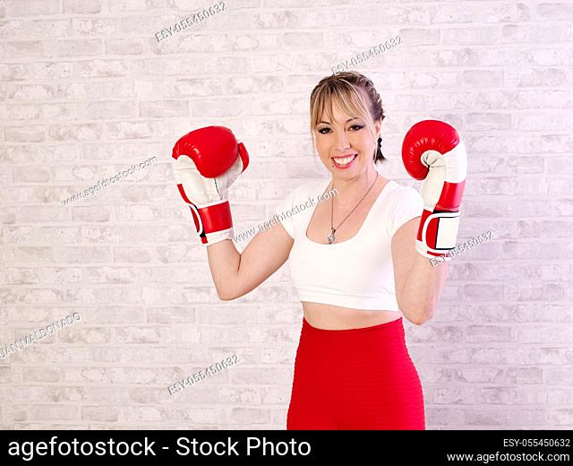 Young woman training and exercising with Boxing