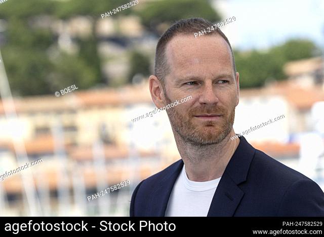 Director Joachim Trier poses at the photocall of 'Verdens Verste Menneske (The Worst Person In The World)' during the 74th Annual Cannes Film Festival at Palais...