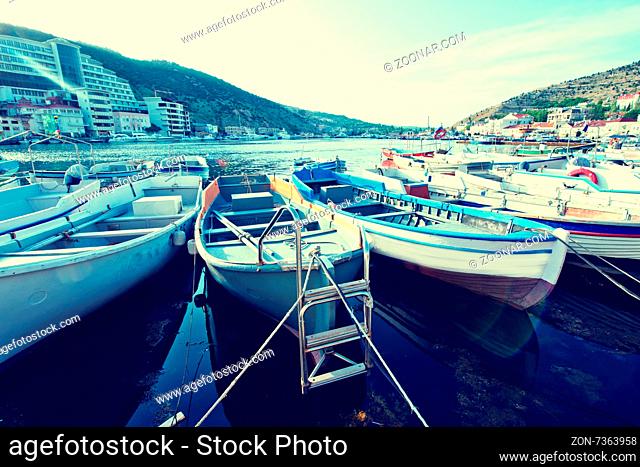 Boats and yachts in old port in Crimea