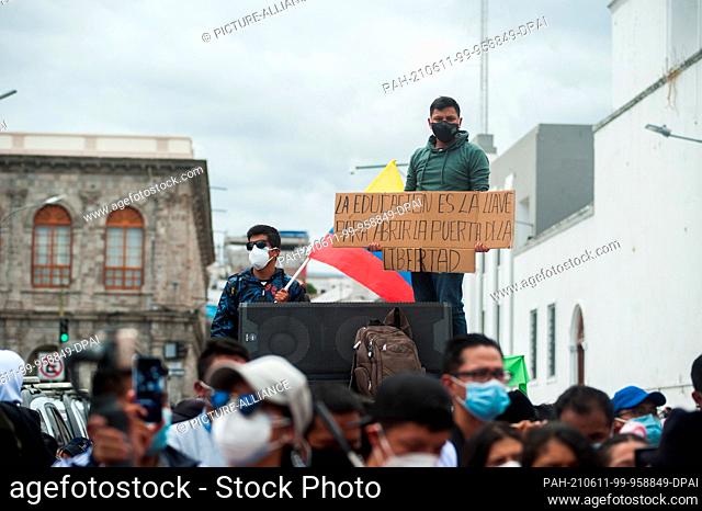 11 June 2021, Ecuador, Latacunga: ""Education is the key to freedom, "" reads the placard of a demonstrator during a protest that also opposed the increase in...