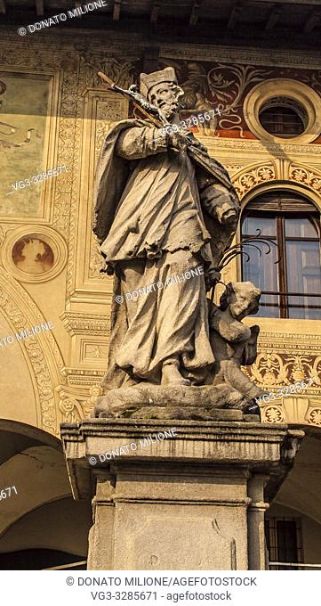 Vigevano, Pavia, Lombardy, Northern Italy. Statue of St. John of Nepomuk (San Giovanni Nepomuceno) in Piazza Ducale