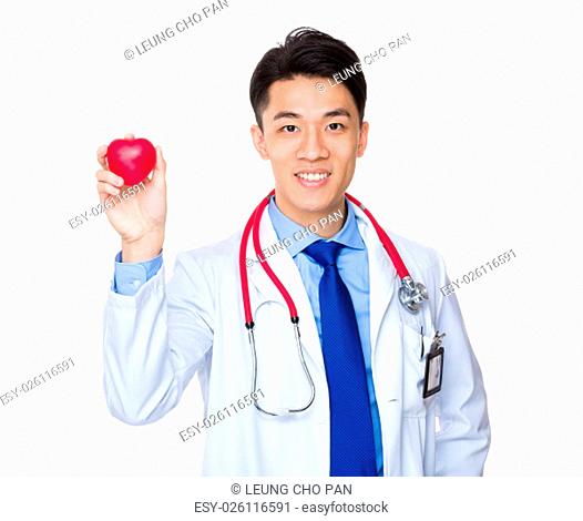 Doctor hold with heart ball
