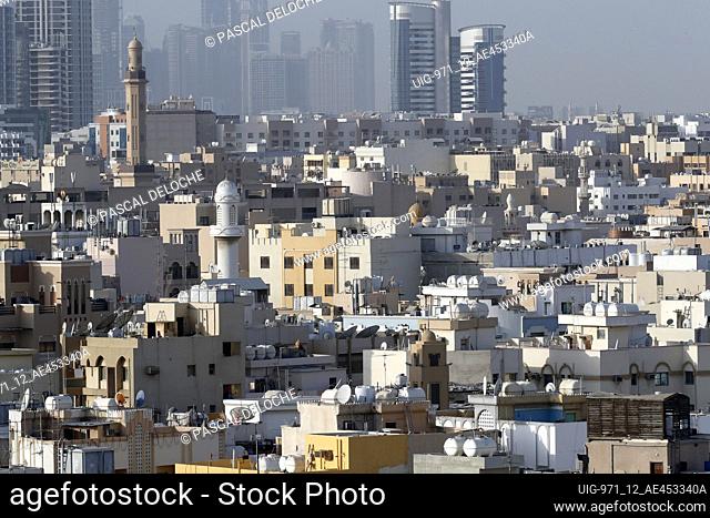 Skyline of Dubai with Old Town housing.  United Arab Emirates