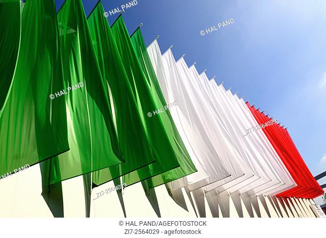 MILAN, ITALY - October 07, EXPO 2015, colored banners create the Italian flag on a pavilion in exposition, shot on oct 07 2015 Milan, Italy