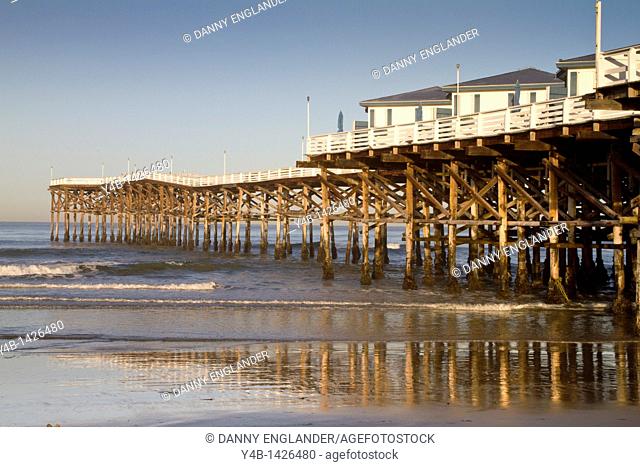 Cottages and pier at sunset, Crystal Pier Hotel, Pacific Beach, San Diego, California
